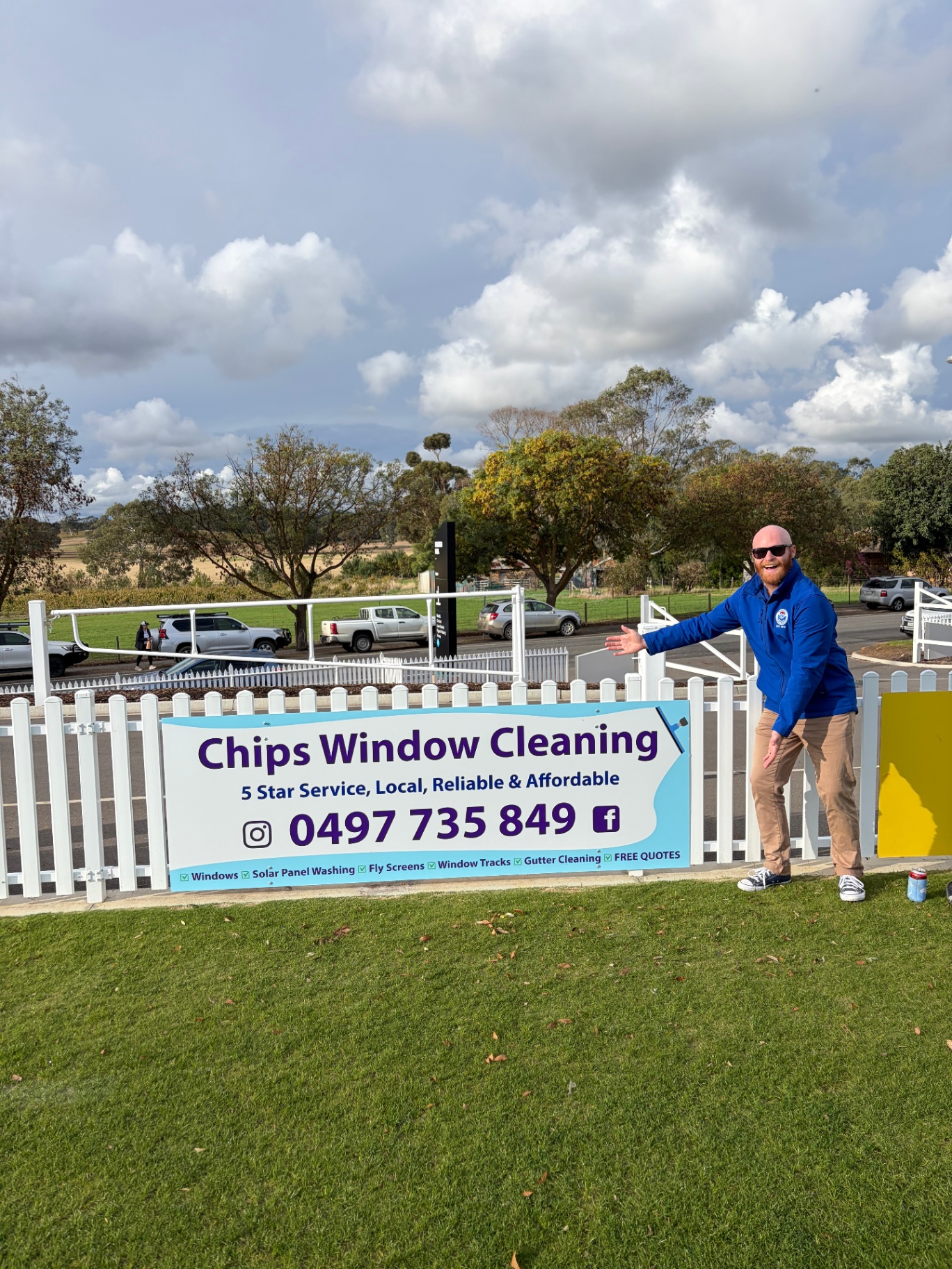 Chips Window Cleaning team member cleaning a sliding glass door