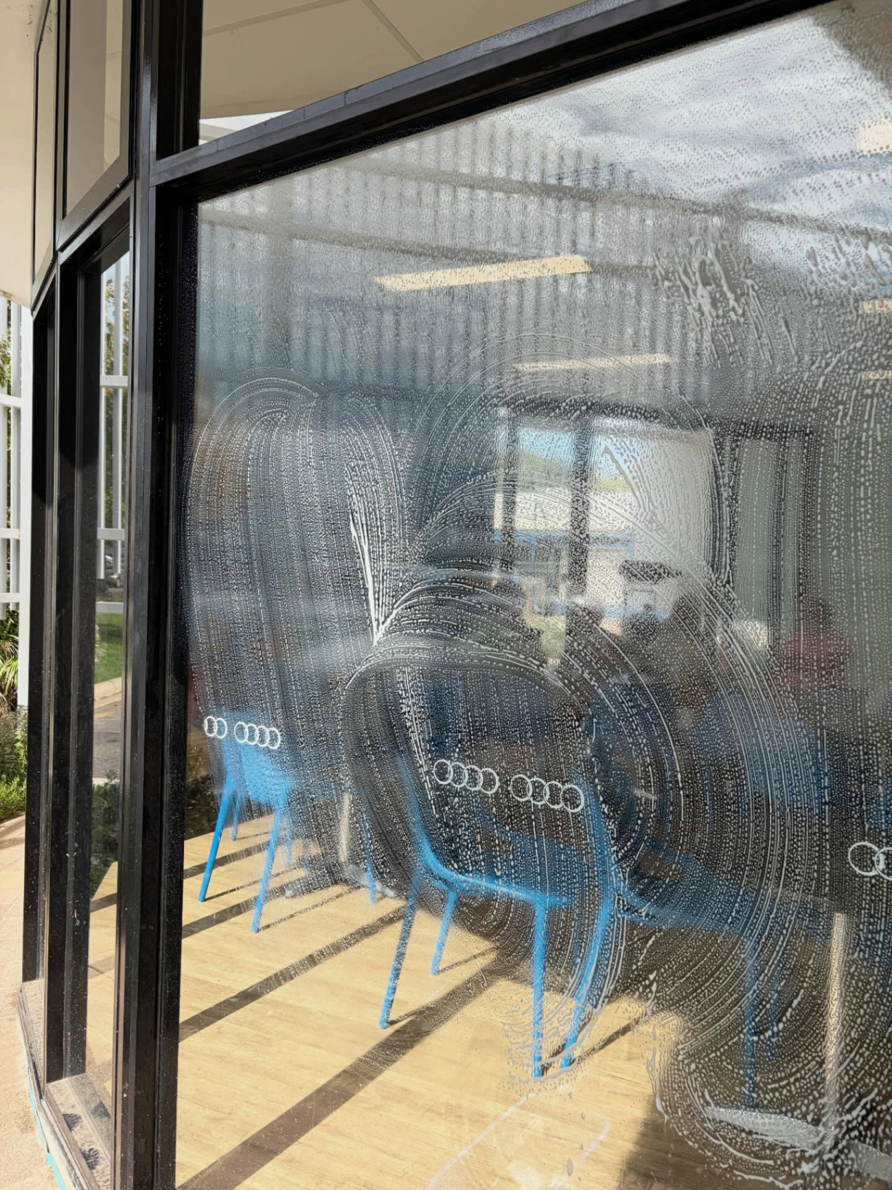Soapy window mid-clean